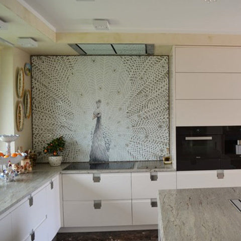 Intricate mosaic tile pattern brings visual interest to kitchen walls