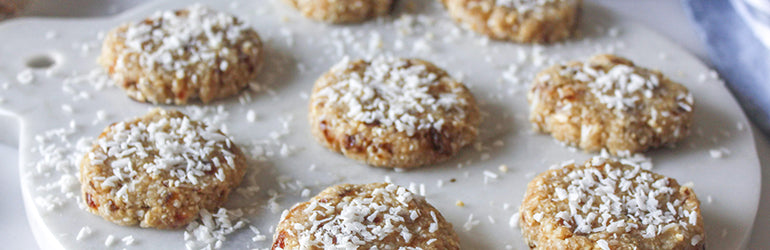 No-bake coconut cookies on a marble tray.