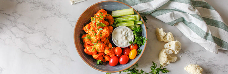 Vegetarian buffalo cauliflower wings in a bowl.