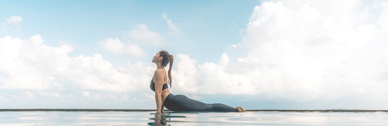 woman in cobra yoga pose