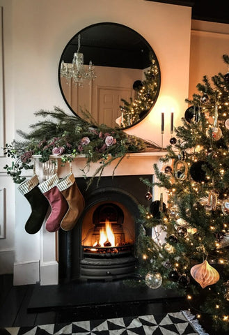 Christmas stockings on fireplace