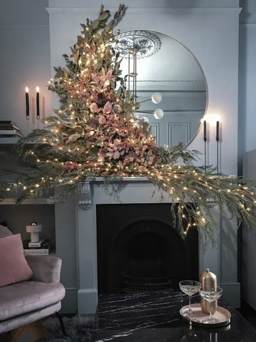 Large Christmas garland on fire place