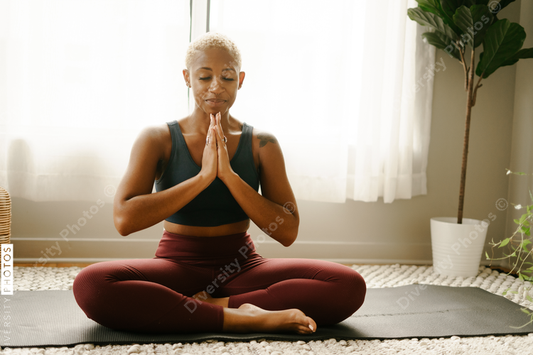 Young Afro African American Woman Meditating Poolside Copy Space Unaltered  Stock Photo by ©Wavebreakmedia 654899006