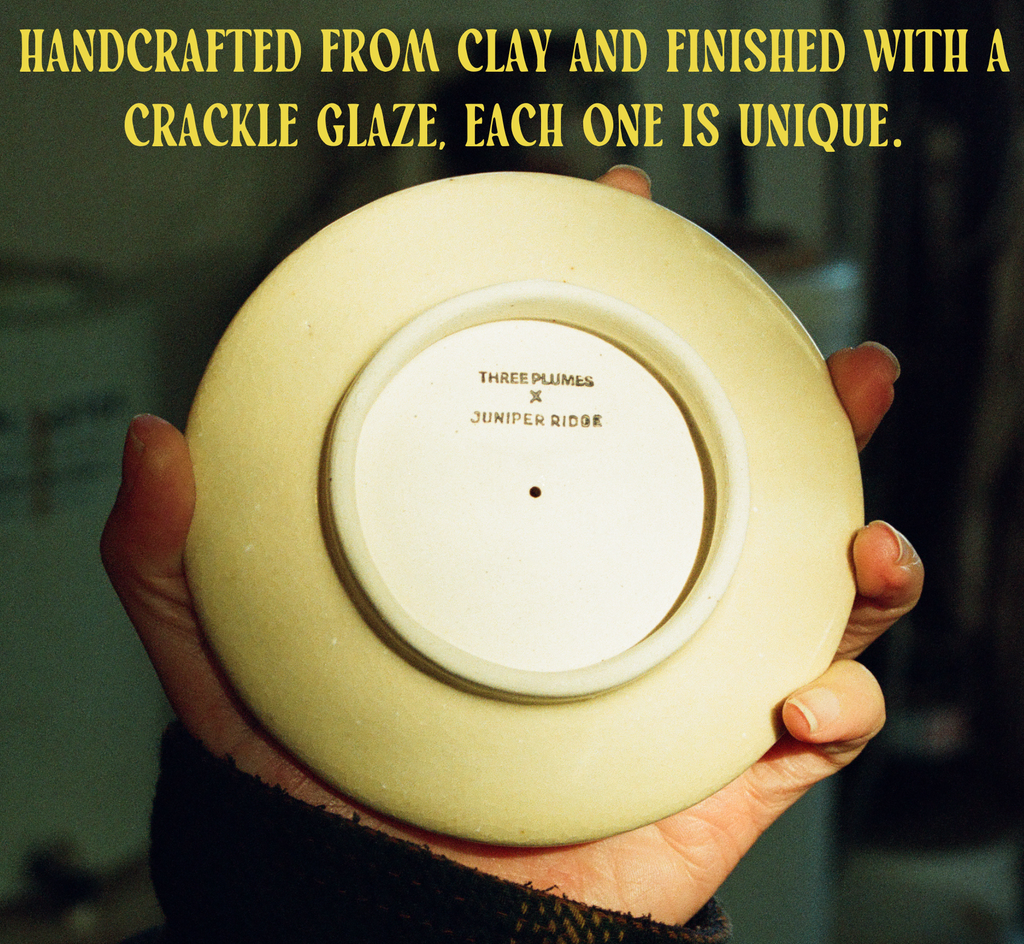 Handcrafted from clay and finished with a crackle glaze, each piece is unique.