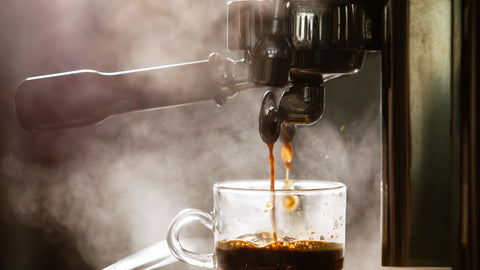 espresso machine with a cup of espresso