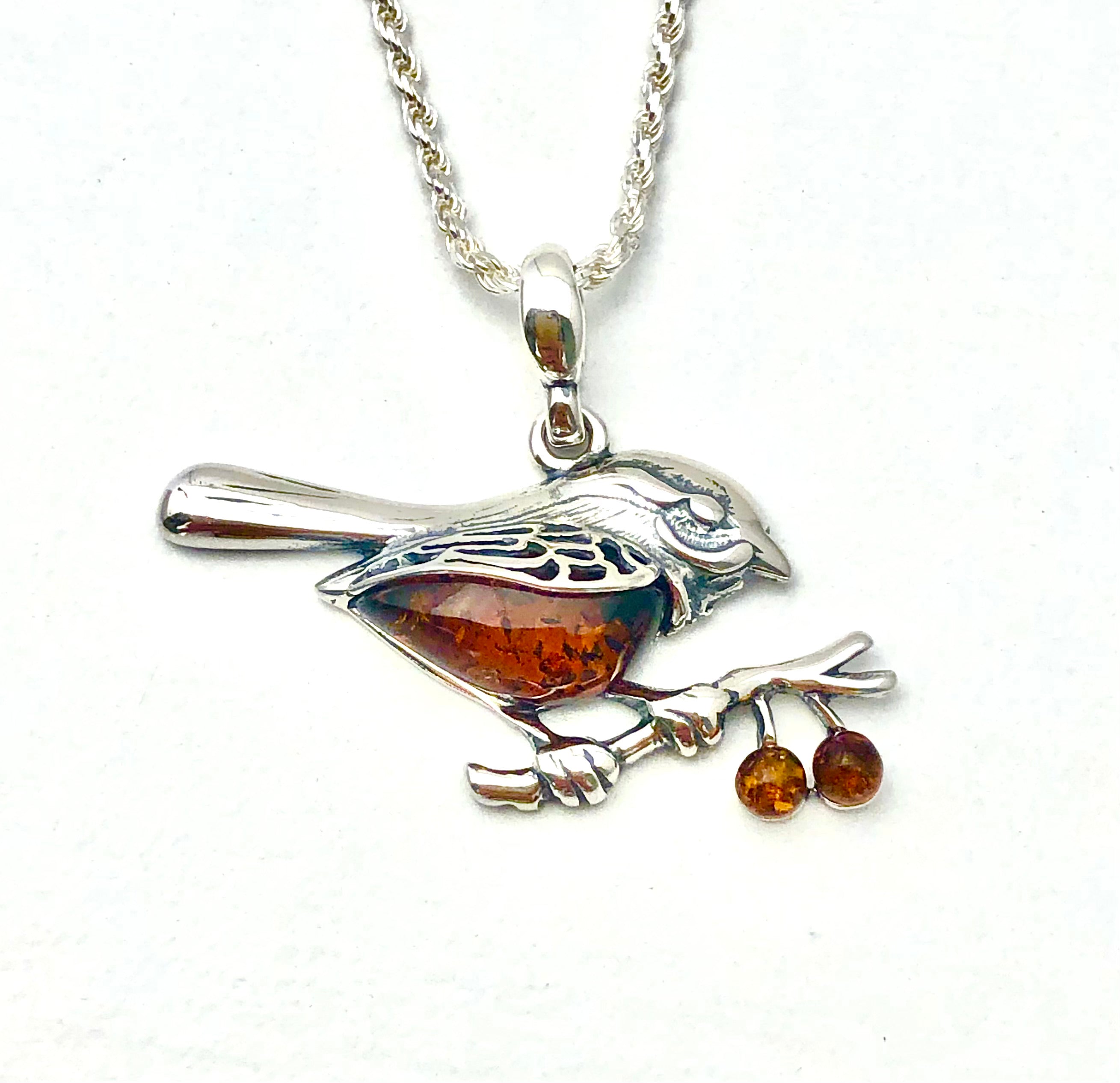 STERLING SILVER BIRD PENDANT WITH HONEY AMBER DETAIL