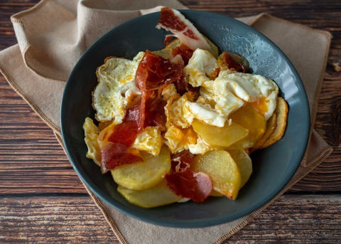 huevos rotos con jamón