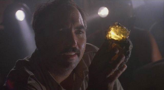 Jurassic Park Screenshot of Juanito Rostagno Holding Amber