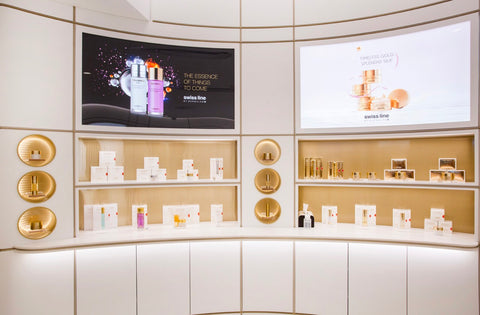 Swissline boutique in Hong Kong with eye catching marble countertops and glass display cases showcasing the wide array of consumer products on offer