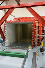 wind tunnel mouth: where wind is directed out of the tunnel and onto research platform