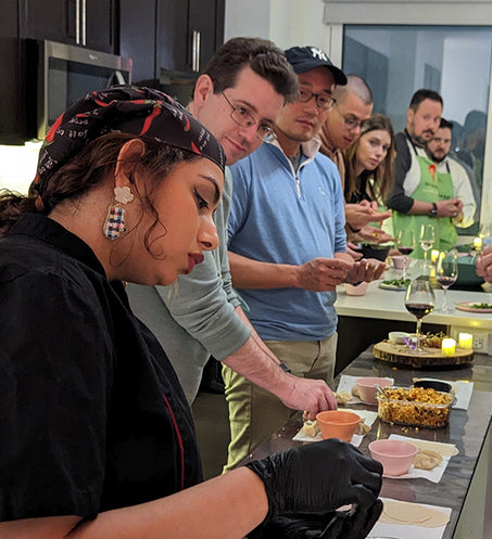 Family posing with their Pad Thai Noodles - Did You Khado Cooking Classes.jpg__PID:a63436bb-2837-45fc-810f-1b5b33a86d0b