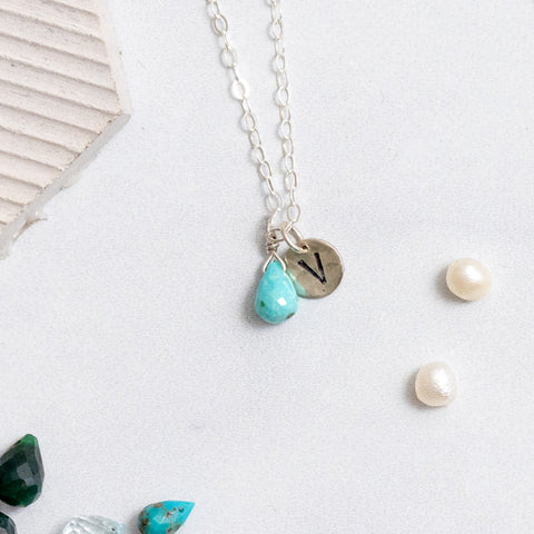 Sterling silver charm necklace with Turquoise