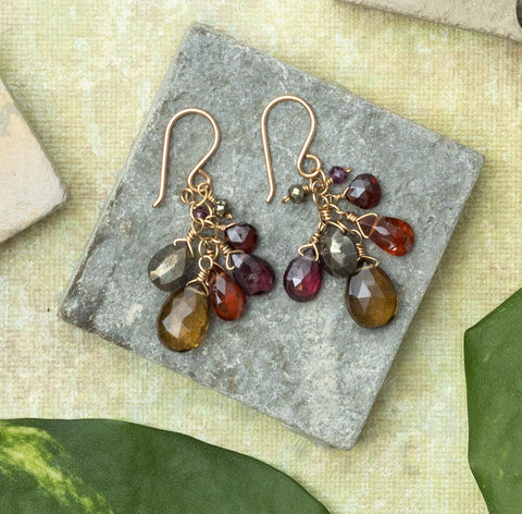 Gemstone cluster earring with garnet and hessonite