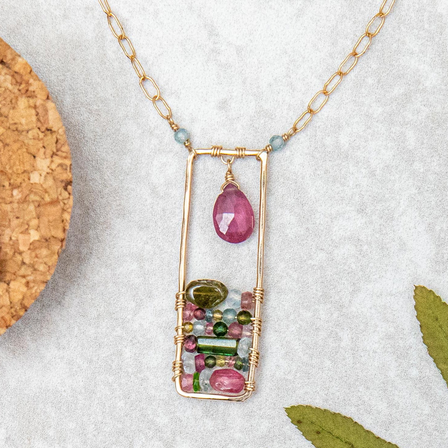 Pink and green tourmaline necklace in gold