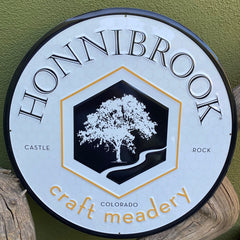 Custom embossed aluminum signs for Honnibrook Craft Meadery