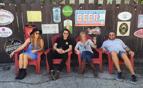 Jen with her husband (far right) and nephew and friend in Austin