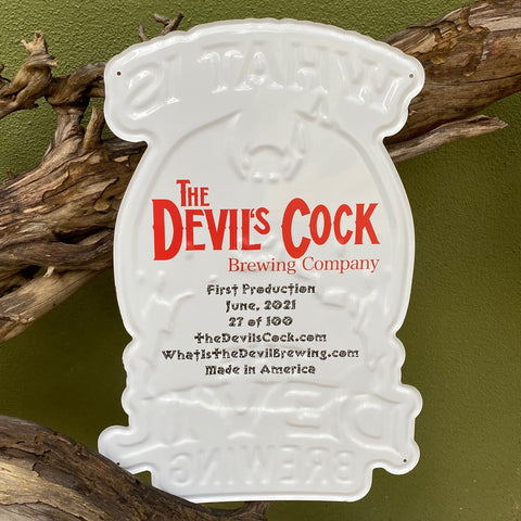 The back side of the What is the Devil Brewing tacker from Devil's Cock Brewing Co
