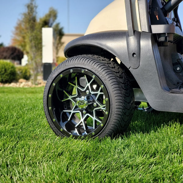 12 inch Matrix black and machined golf cart wheel and tire combo installed on cart.