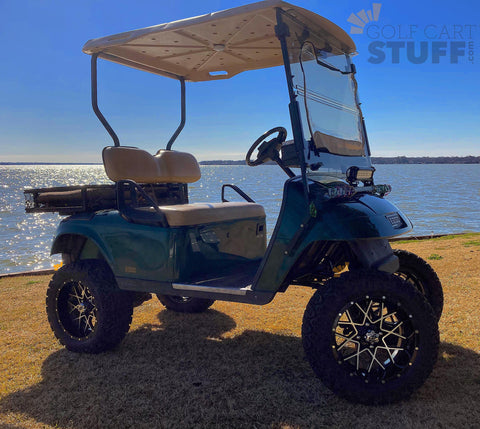 14" Matrix Black/Machined Aluminum Golf Cart Wheels with 23 inch All terrain Tires on a lifted EZGO TXT. Get your wheels and tires at GOLFCARTSTUFF.com today!