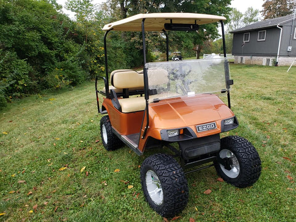 Customer installed EZGO TXT LED light kit showing the front headlight assemblies.