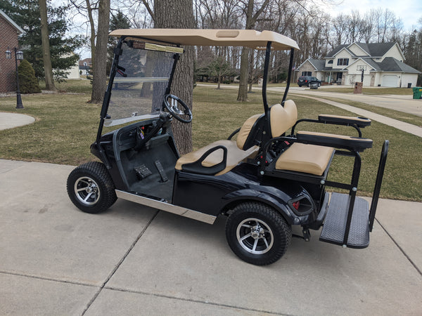 Stainless steel rocker panels installed on EZGO TXT Valor model.