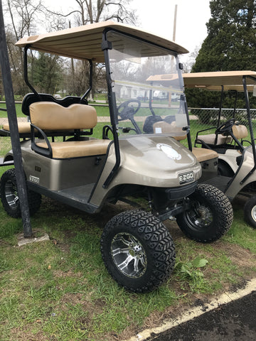 Gunmetal 23" off-road wheel and tire combo installed on customer EZGO TXT Valor golf cart.