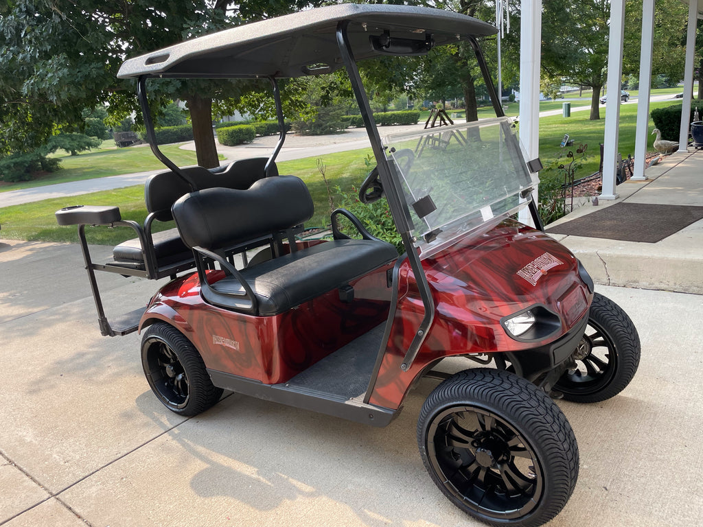Customer photo of Vampire wheels and low profile tires installed on EZGO Valor Freedom TXT golf cart and Instamatic Deluxe LED light kit.