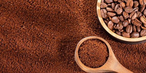 an image of coffee beans and ground coffee. 