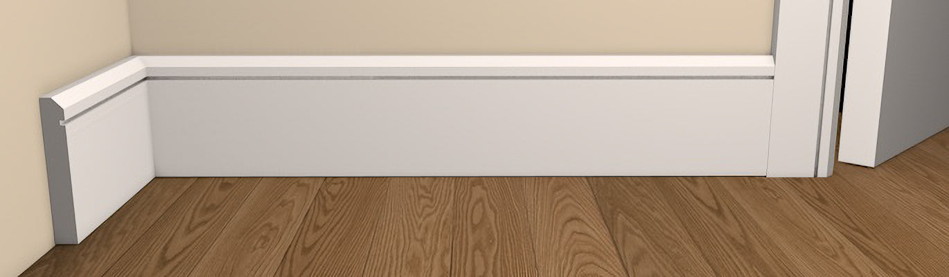 Contemporary Style Bevelled Single Shaker Architrave and Skirting - Pre-Primed/Pre-Painted Wood shown fitted to a wall