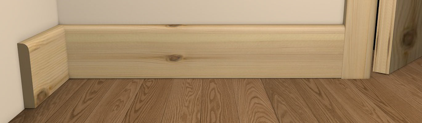 Contemporary Style Bullnose Architrave and Skirting - Pre-Varnished Redwood shown fitted to a wall