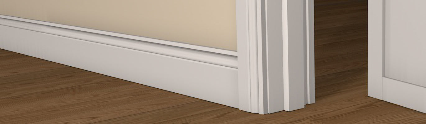 Pre-Primed Fire Door Frame shown fitted within a doorway, complimented by architrave on each side