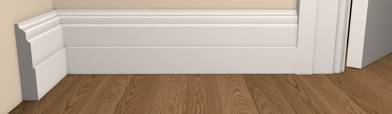 Period Style Dromoland Architrave and Skirting - Pre-Primed/Pre-Painted Wood shown fitted to a wall