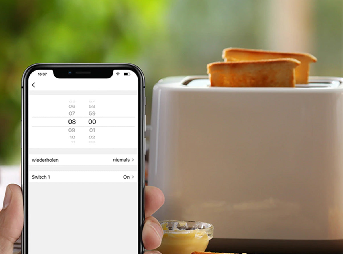 Un smartphone controllant un grille pain