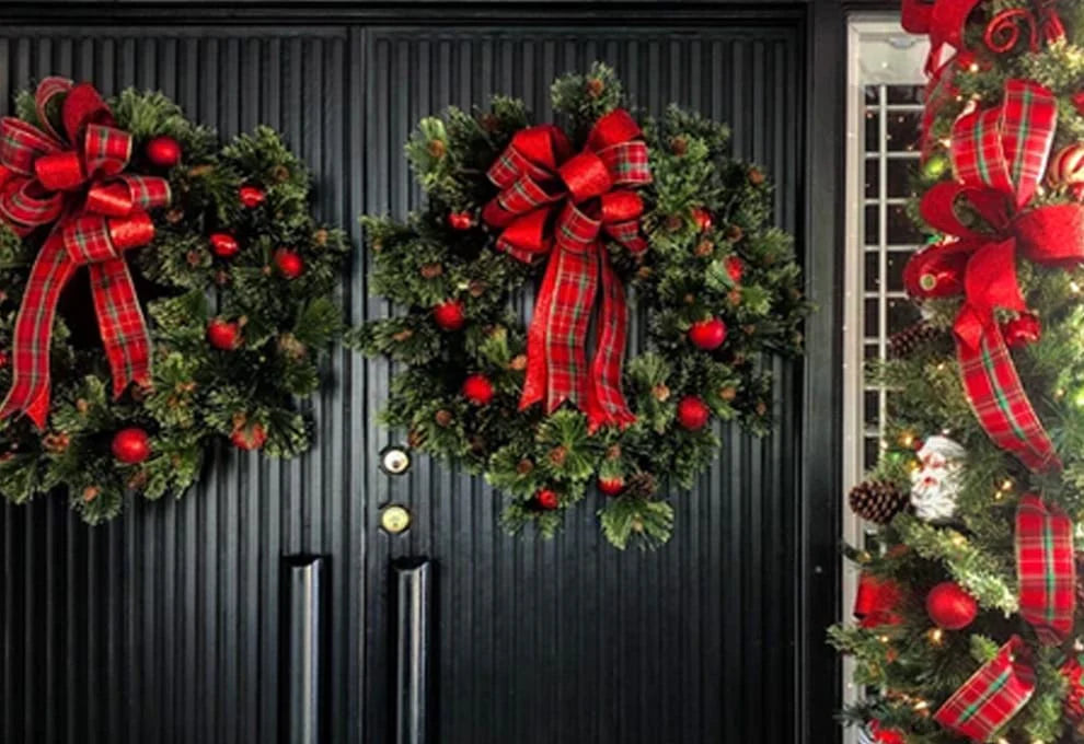 Christmas wreaths on a home's front doors