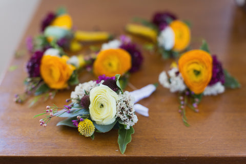 ranunculus boutonnieres in golds and plums by Gorgeous and Green, Tiburon Wedding