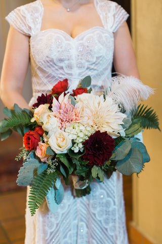 Bridal bouquet with feather by Gorgeous and Green for wedding Berkeley City Club