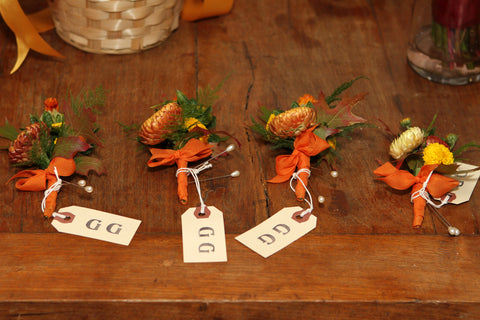 Boutonnieres in fall colors by Gorgeous and Green