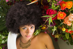 model with flower installation garden inspired bathtub in Oakland