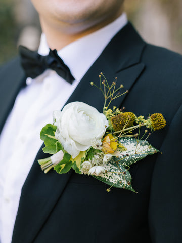 Groom detail shot with the textural boutonniere for a summer wedding with romance and tropical feels by Gorgeous and Green