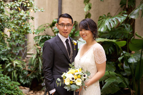 The wedding couple in the garden at the Berkeley City Club, bridal bouquet by Gorgeous and Green