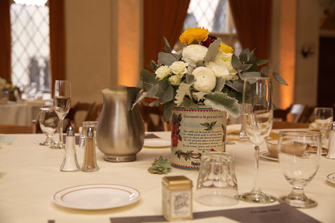 The Bride and Groom collected tin cans to reuse for centerpieces, by Gorgeous and Green