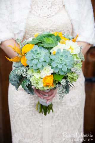 Succulent hydrangea dusty miller ranunculus bridal bouquet by Gorgeous and Green