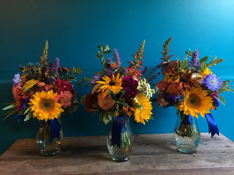 Bridesmaid bouquets with lots of color and pops of sunflowers by Gorgeous and Green