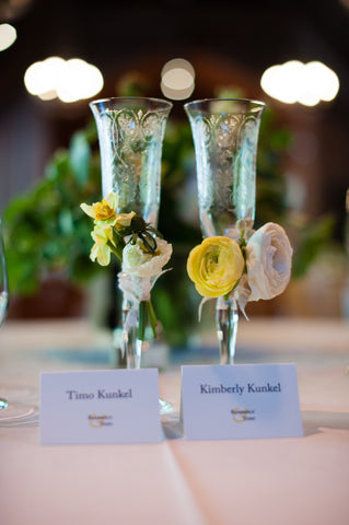 adorable champagne flutes adorned with flowers by Gorgeous and Green for wedding at Mill Valley Art Club