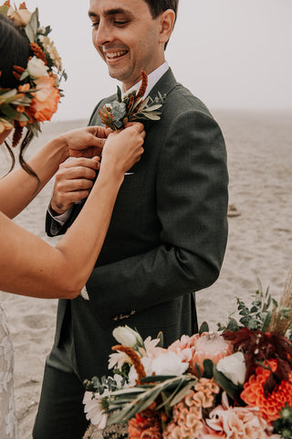 Boutonniere and Bridal Bouquet by Gorgeous and Green for a Stinson Beach wedding with fog and waves