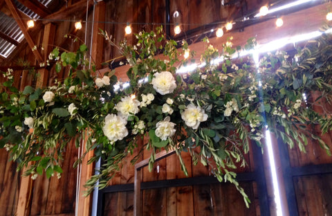 olive branch arch for a wedding by Gorgeous and Green