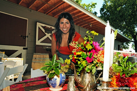 Pilar Zuniga, of Gorgeous and Green designing florals for an outdoor wedding at Diablo Ranch