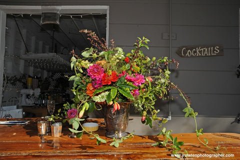 Beautiful and unique bar arrangement for a wedding at Diablo Ranch, florals by Gorgeous and Green