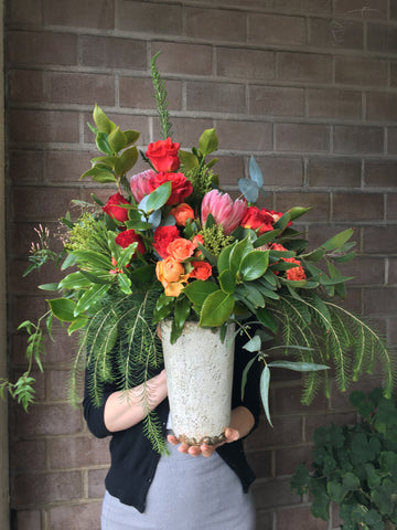 Large arrangement of foliage and bright blooms for Local delivery by Gorgeous and Green.