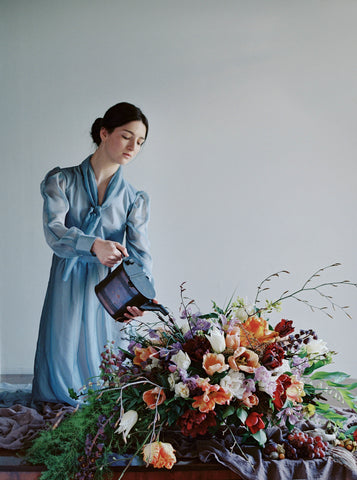 Model with watering can and Florals by Pilar Zuniga of Gorgeous and Green